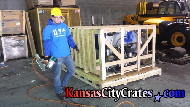 Large slat crate loaded onto industrial pallet
