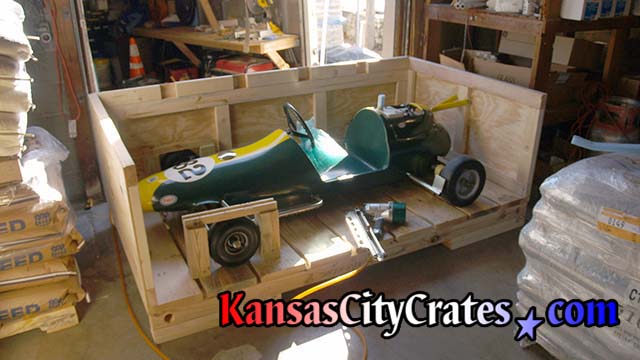 Go-Kart secured inside industrial crate