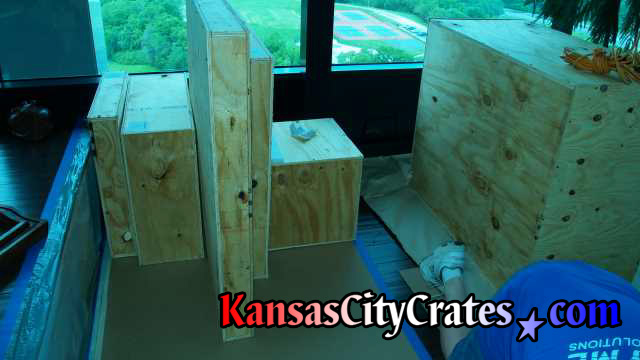 Once crates are finished they are left on cardboard to protect the floor.