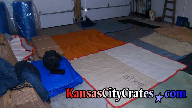 We lay out blankets on concrete garage floors too!