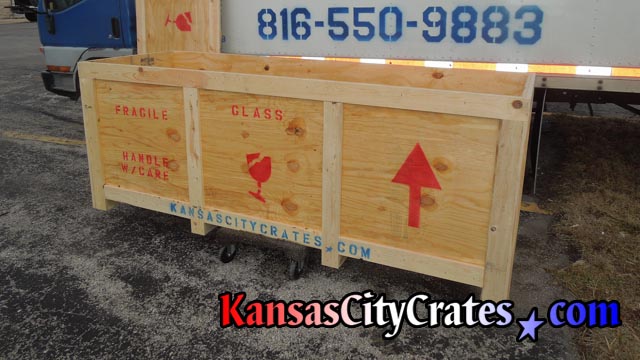 Large shipping vault on cart loading for delivery to business in Kansas City MO.
