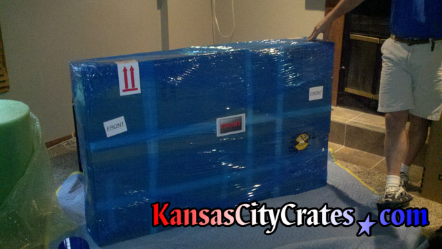 LG LED TV packaged for loading into crate at home in Kansas City MO  64146