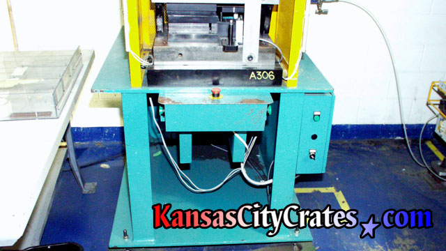 Measuring press for manufacturing computer parts to crate for shipment to Japan.