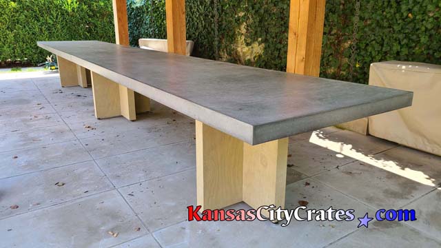 20 foot outdoor comcrete estate tables under Pergola at home in Mission Hills KS