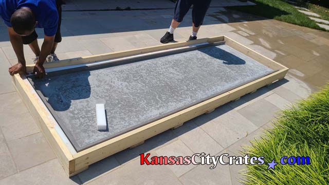 Dense thick foam surrounds concrete table