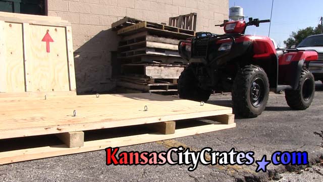 Crate pallet bottom in place for Honda ATV to load