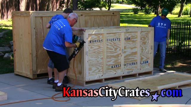 Attaching last end panel of crate for motorcycle shipping