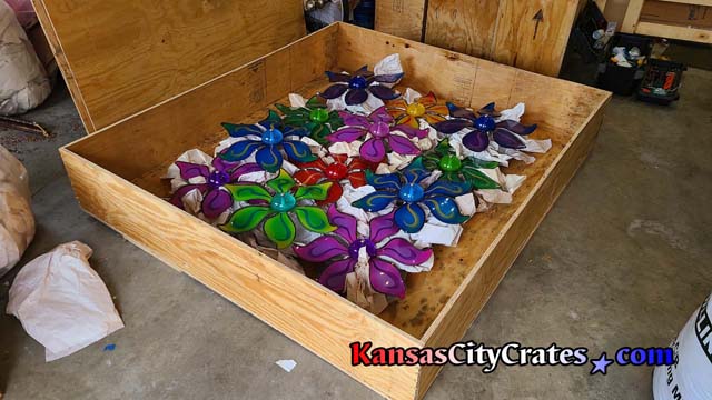 Arcylic flower sculpture packed in crate