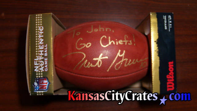 Trent Green autographed football personalized and given to John McLaughlin for his work
